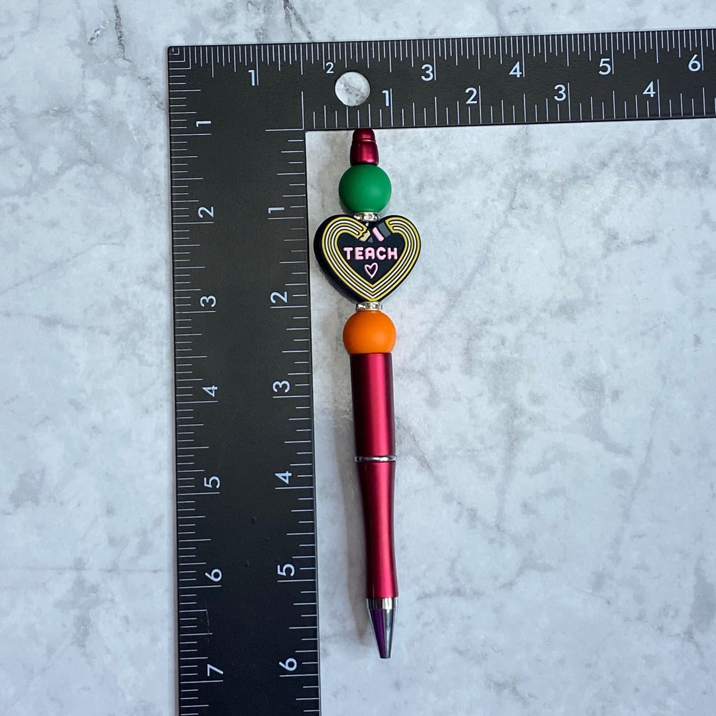Measurement of Red Beaded Pen with Heart Teach Character Bead