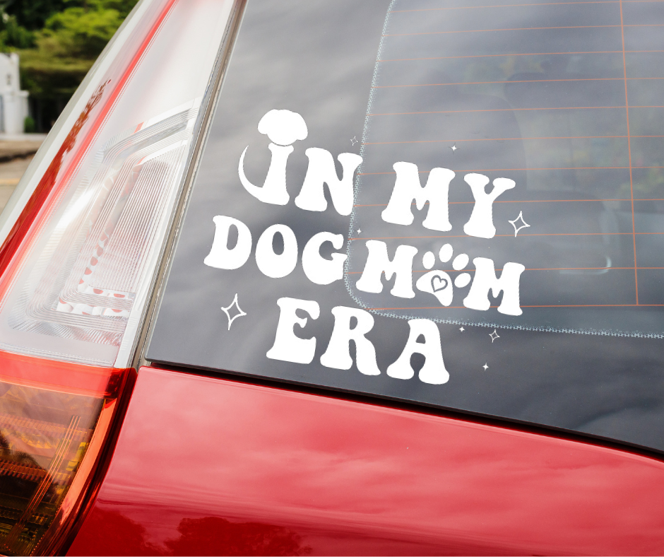 In My Dog Mom Era Decal on the Back of a Red Car