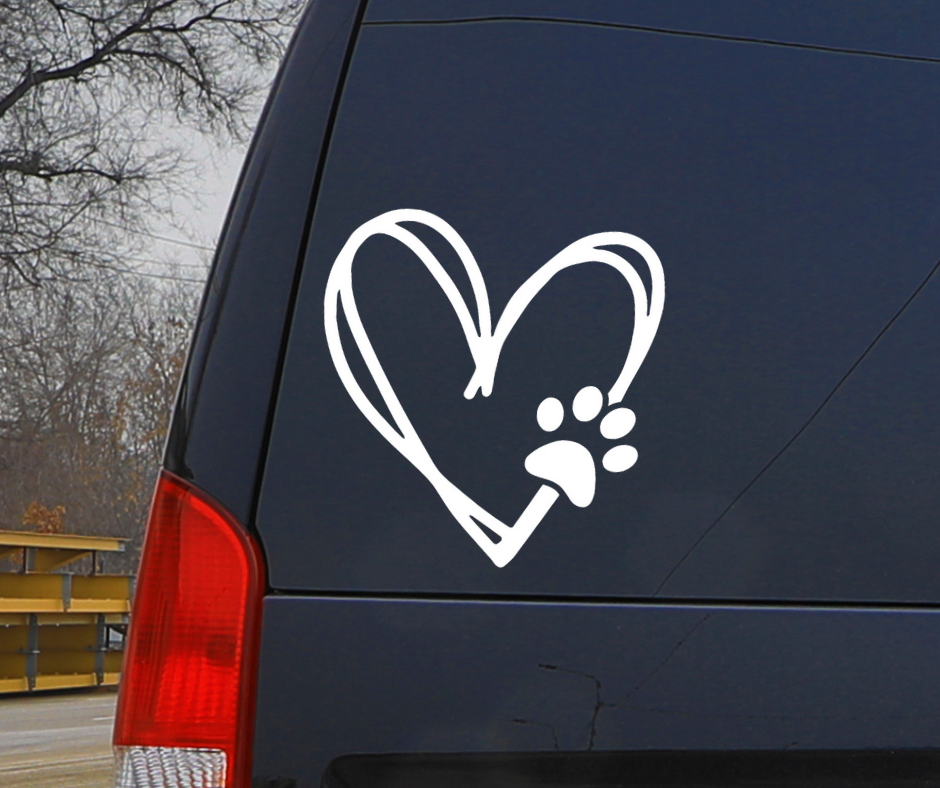 Heart with Dog Paw Decal on the Back of a Black SUV