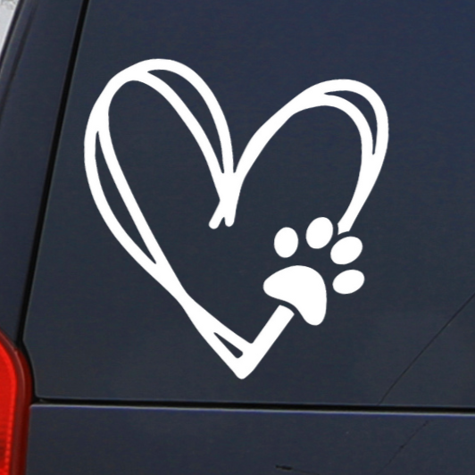 Close Up of Heart with Dog Paw Decal on the Back of a Black SUV