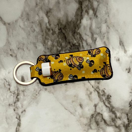 Front Side of Custom ChapStick holder Bee Kind