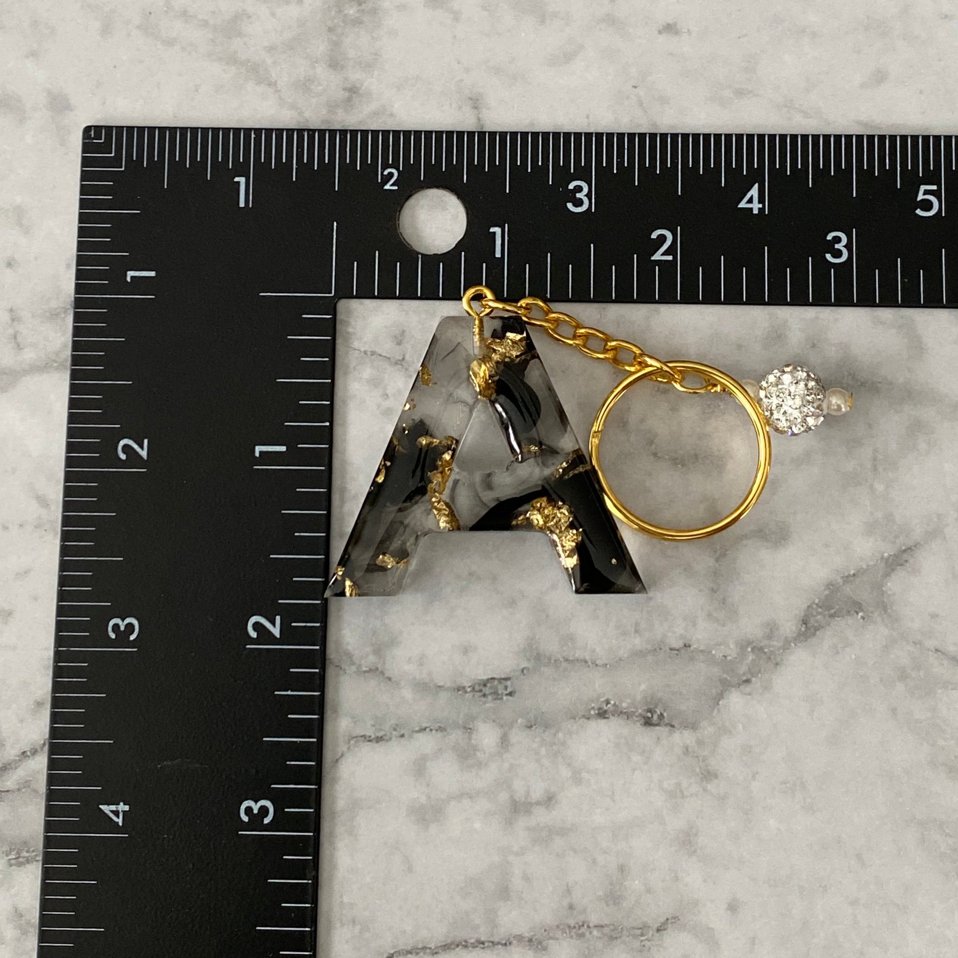 Measurement of the Letter A, Clear Resin Alphabet Letter Keychain with Gold Flake and Black Accents