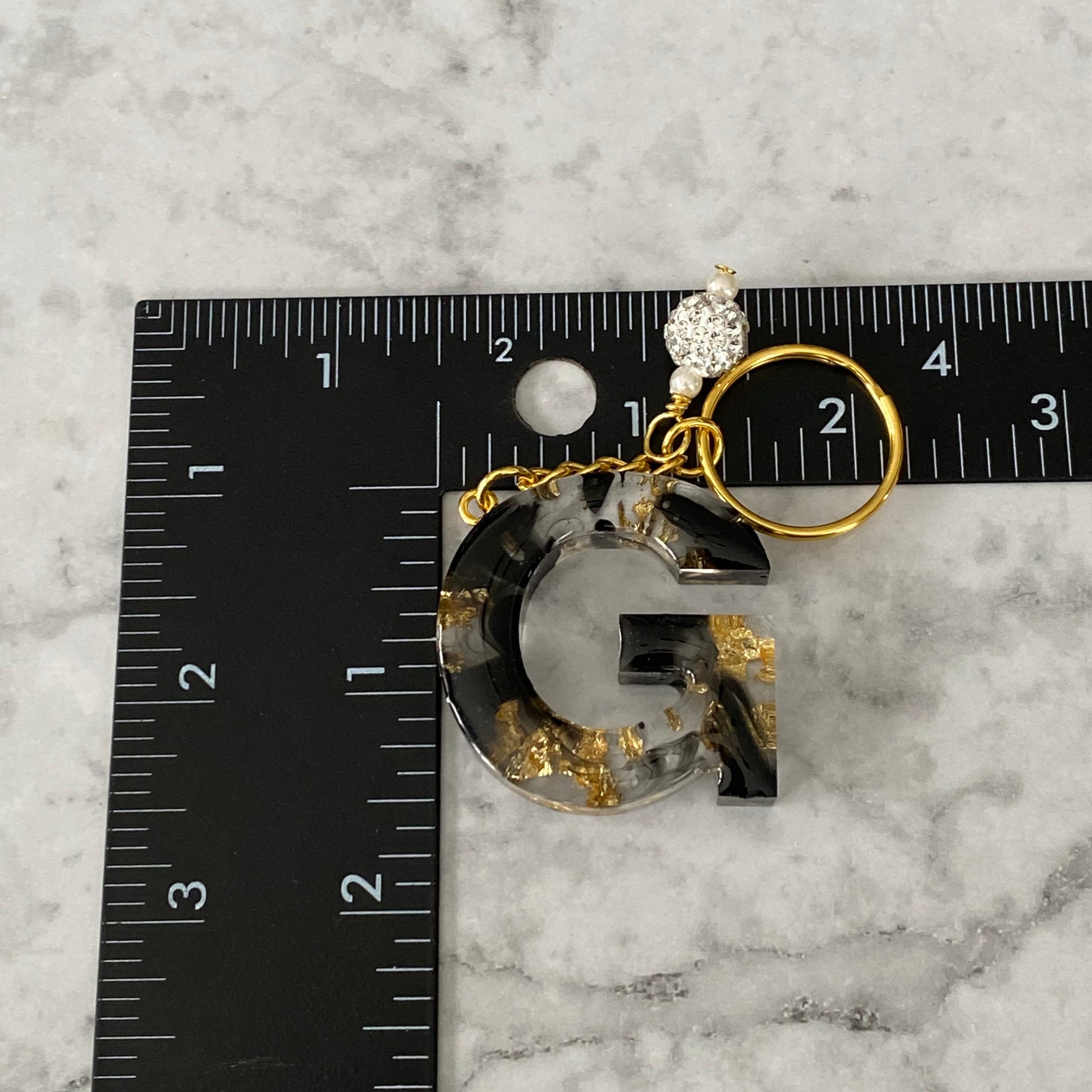 Measurement of the Letter G, Clear Resin Alphabet Letter Keychain with Gold Flake and Black Accents