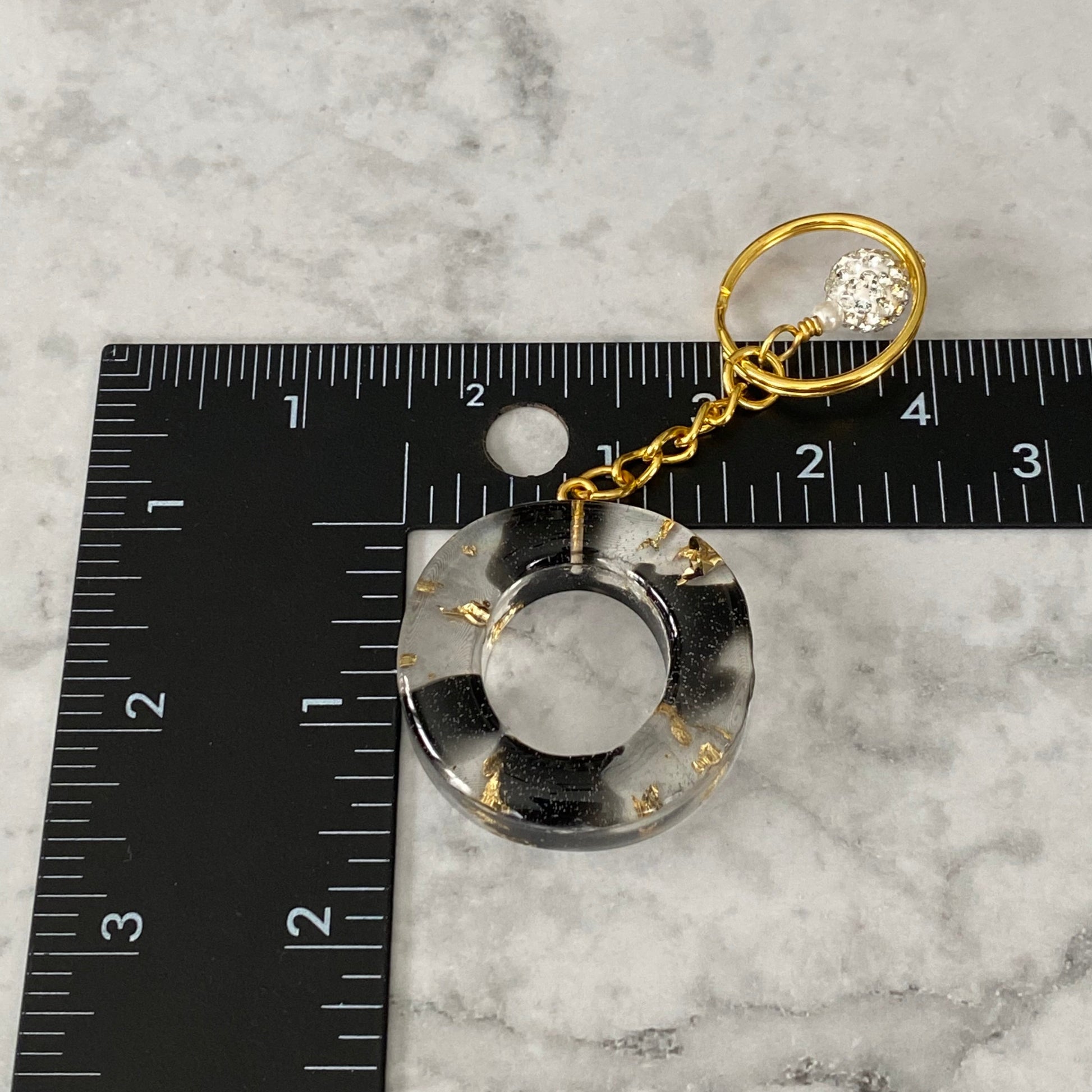 Measurement of the Letter O, Clear Resin Alphabet Letter Keychain with Gold Flake and Black Accents