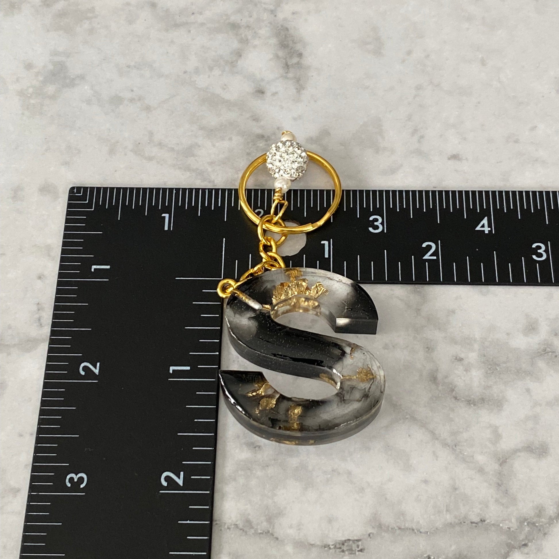 Measurement of the Letter S, Clear Resin Alphabet Letter Keychain with Gold Flake and Black Accents