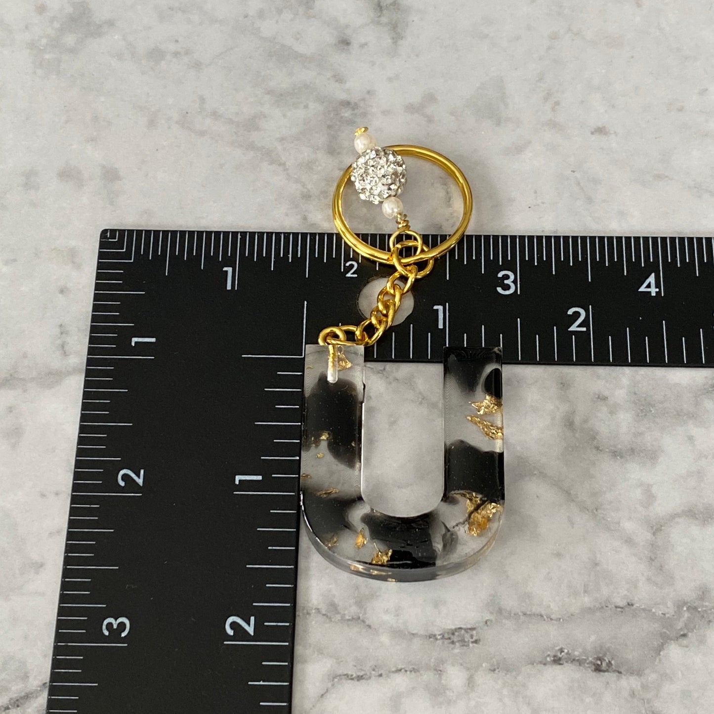 Measurement of the Letter U, Clear Resin Alphabet Letter Keychain with Gold Flake and Black Accents