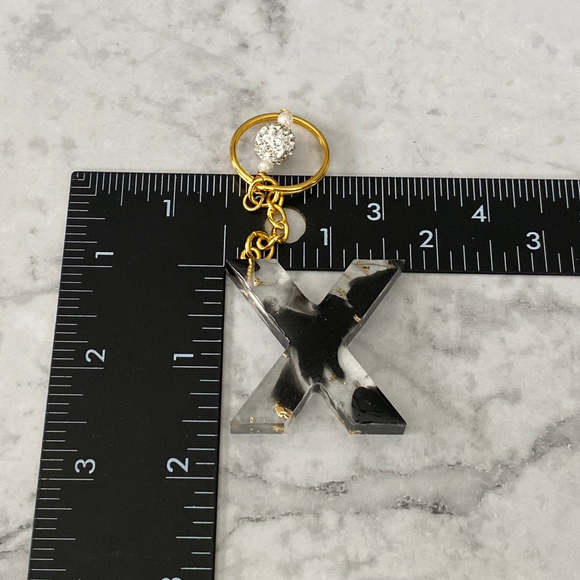 Measurement of the Letter X, Clear Resin Alphabet Letter Keychain with Gold Flake and Black Accents