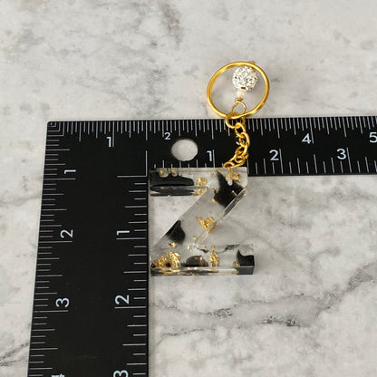 Measurement of the Letter Z, Clear Resin Alphabet Letter Keychain with Gold Flake and Black Accents