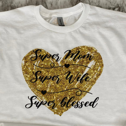 Close up of Glitter Gold Heart Super Mom DTF T-Shirt