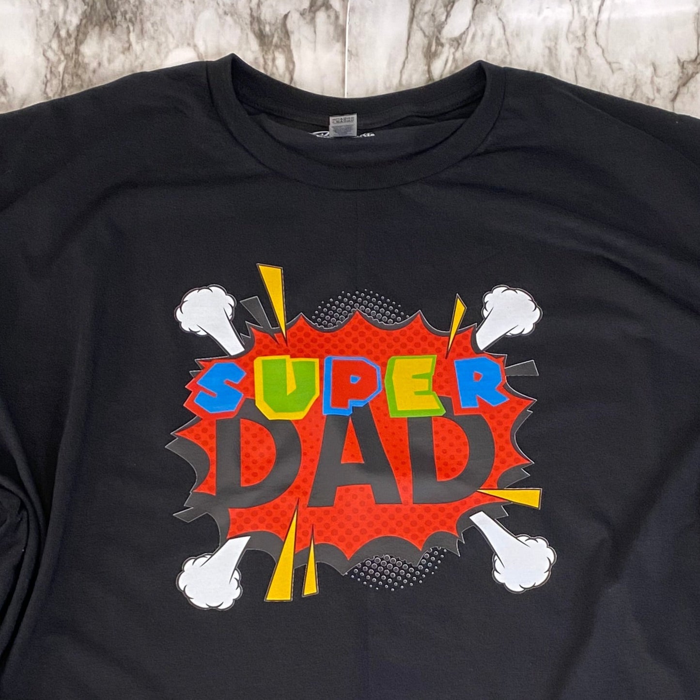 Close up of Super Dad on Red Pow DTF T-Shirt